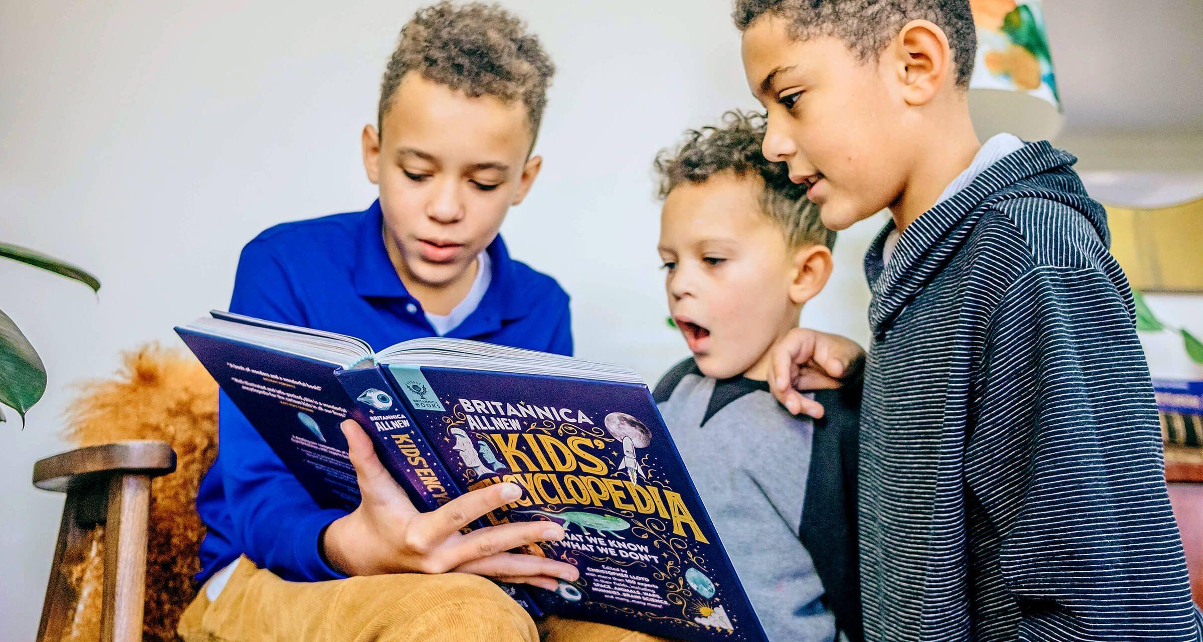 Children reading Britannica All New Kids' Encyclopedia